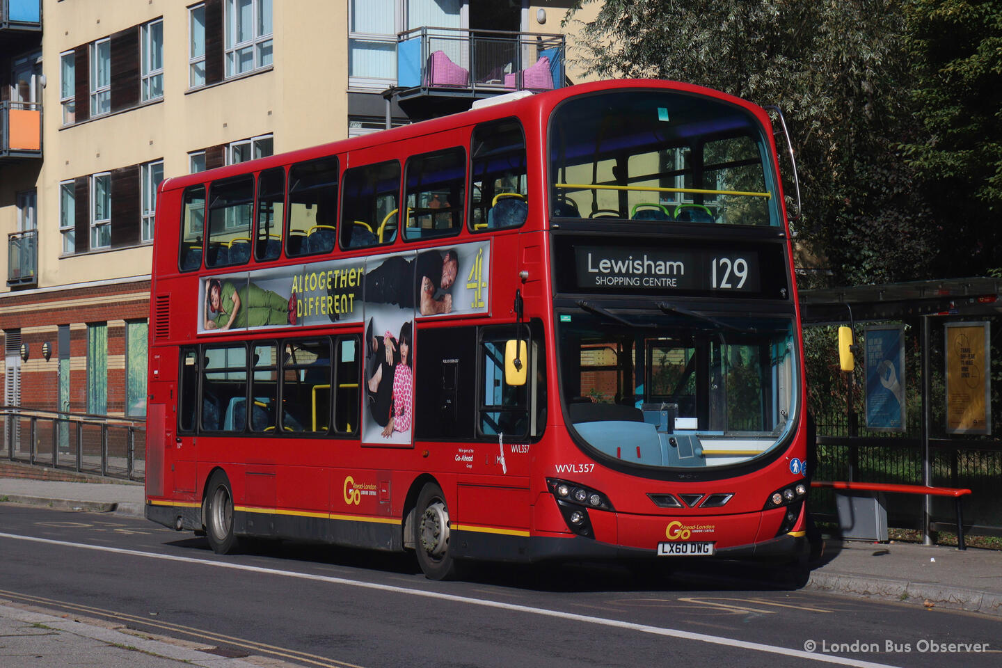Go-Ahead London WVL357 (LX60 DWG), a Wright Eclipse Gemini 2-bodied Volvo B9TL in Go-Ahead London livery, photographed in Greenwich Peninsula operating a 129 service to Lewisham, Shopping Centre.